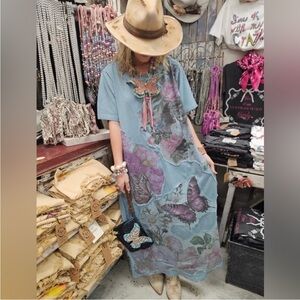 A Rare Bird Butterfly Floral Maxi Dress in Dusty Blue with appliqué details